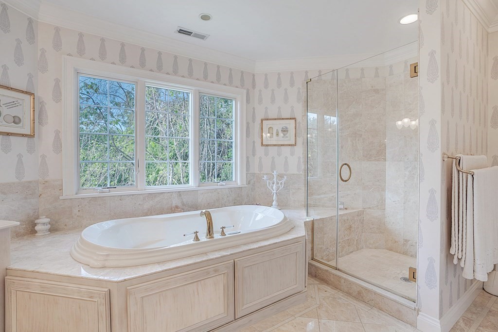 32 Bancroft Road Andover, MA 01810 - Photo 33 of 41 a bathroom with a tub shower and sink