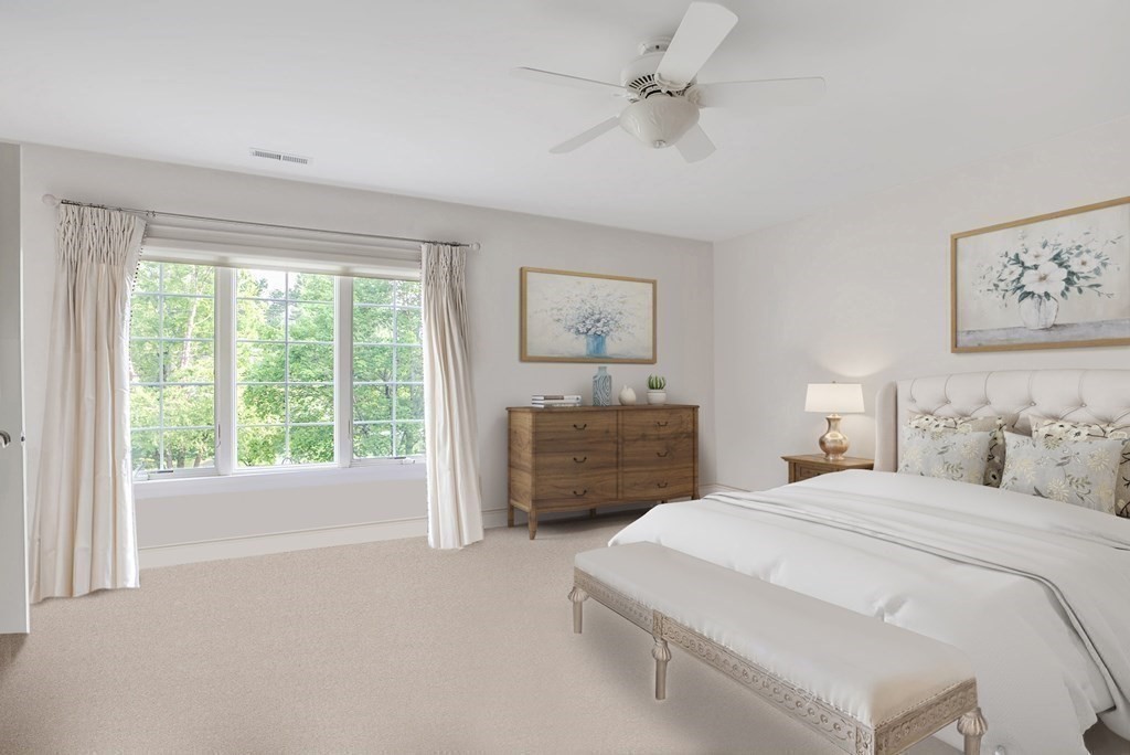 32 Bancroft Road Andover, MA 01810 - Photo 35 of 41 a bedroom with a balcony a bed and a chandelier