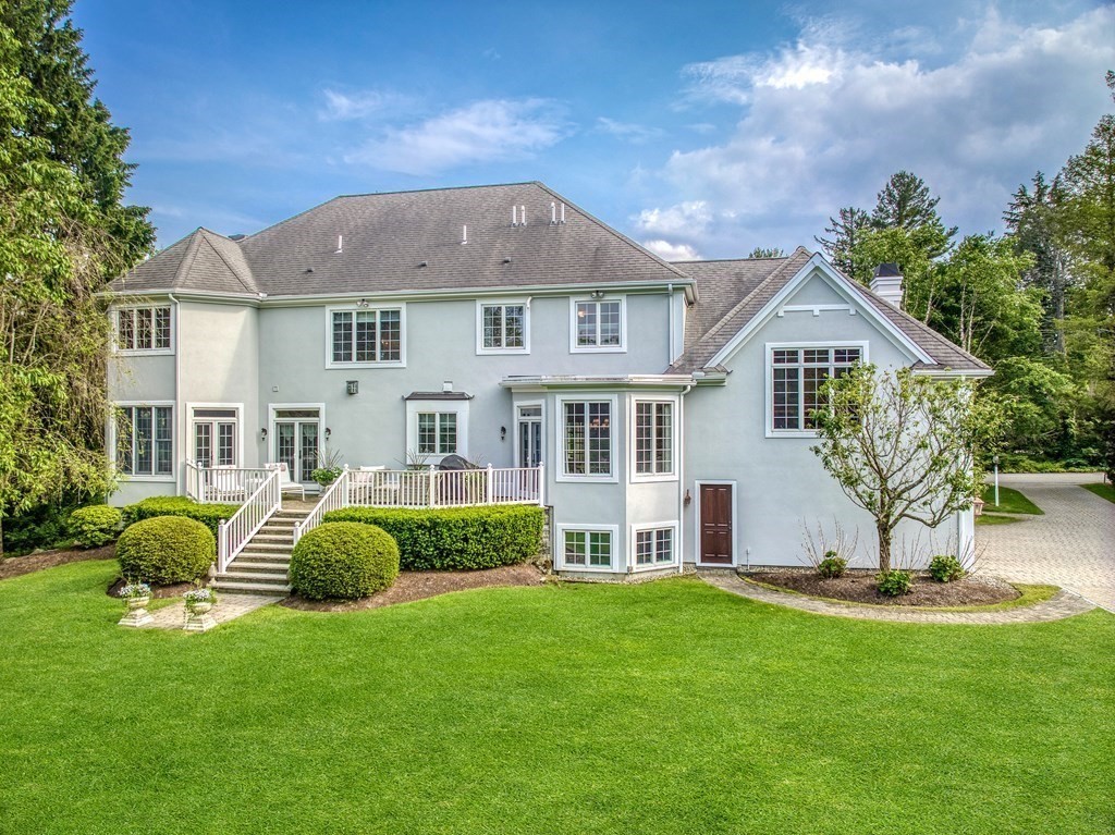 32 Bancroft Road Andover, MA 01810 - Photo 5 of 41 a front view of a house with a yard