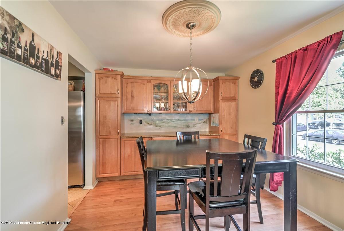 6 Timberline Drive Howell, NJ 07731 - Photo 7 of 12 a view of a dining room with furniture window and wooden floor