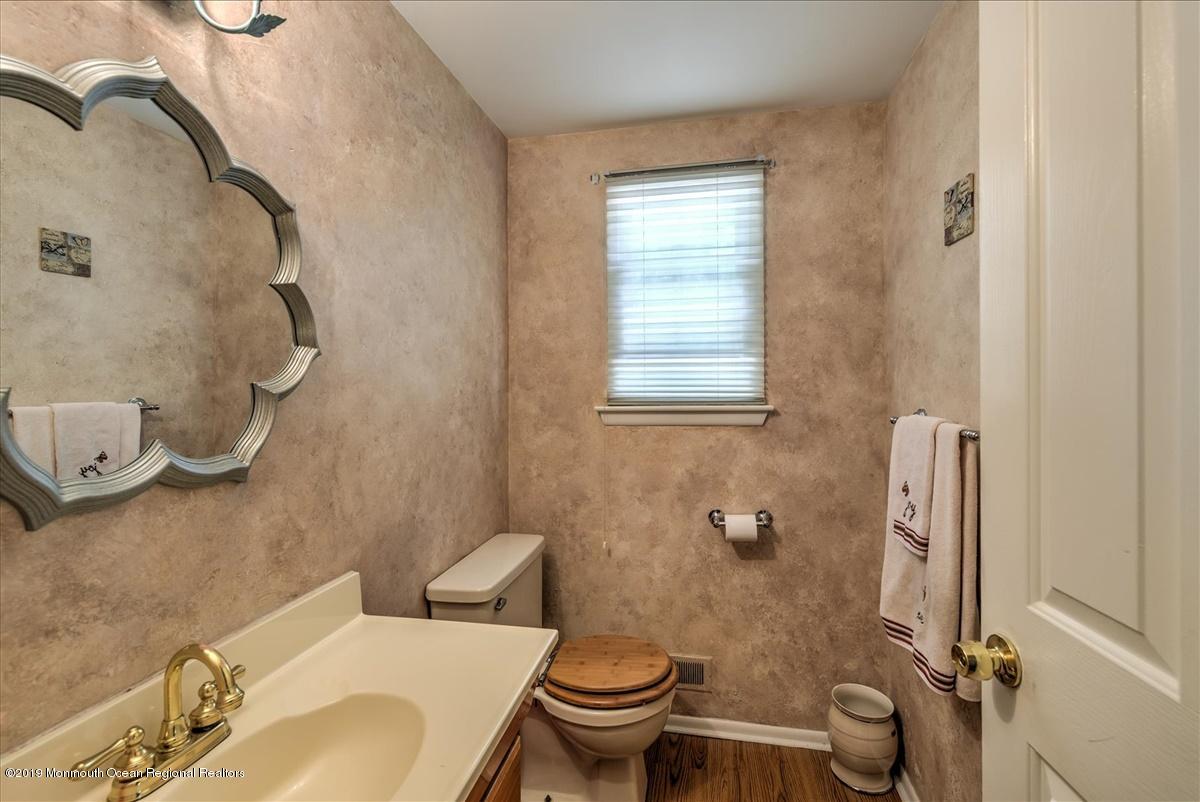 6 Timberline Drive Howell, NJ 07731 - Photo 9 of 12 a bathroom with a sink and toilet