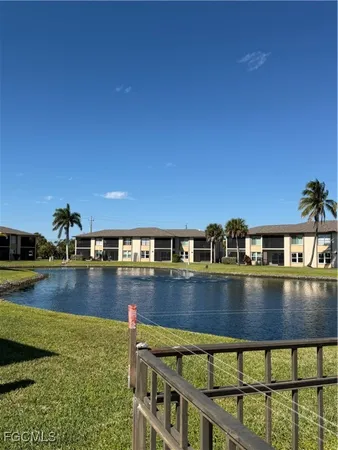a view of swimming pool from a balcony