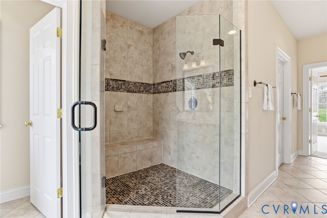 3100 Sodbury Court Midlothian, VA 23113 - Photo 39 of 94 Spacious custom tiled shower with glass enclosure.