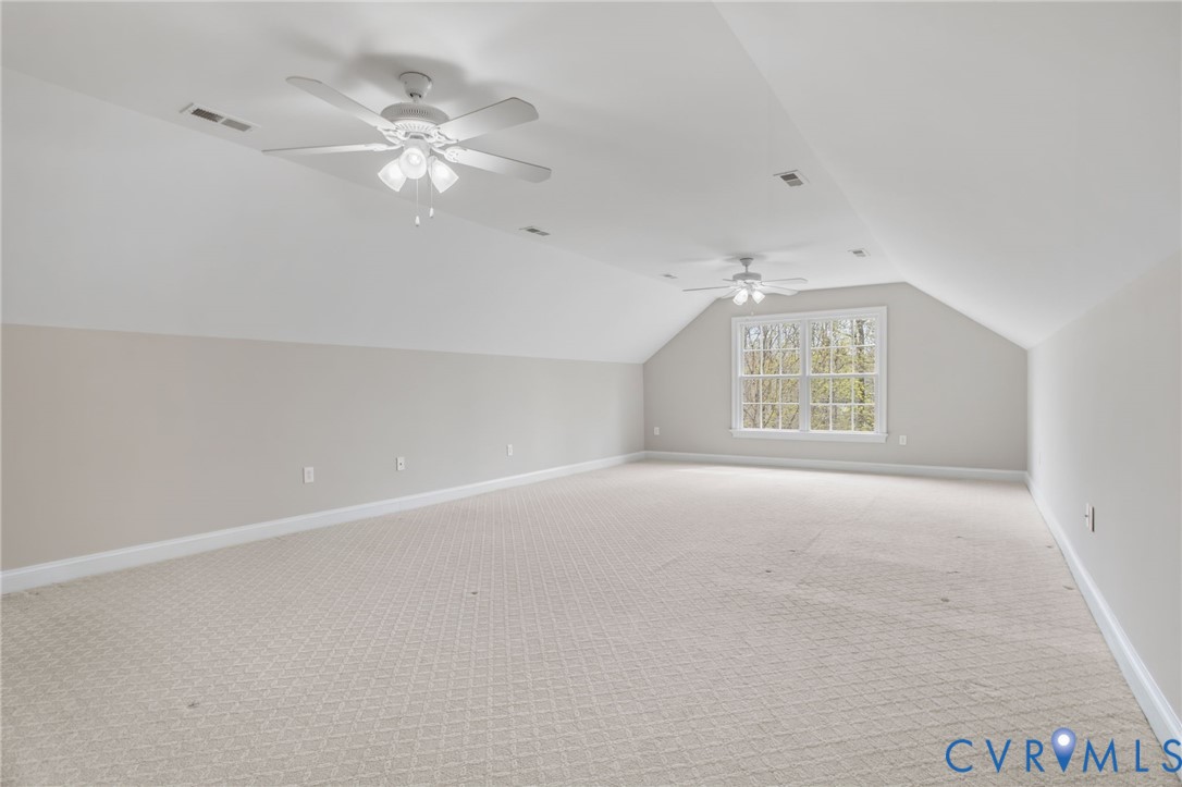 3100 Sodbury Court Midlothian, VA 23113 - Photo 55 of 94 an empty room with chandelier fan and windows