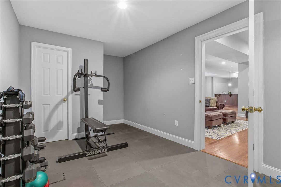 3100 Sodbury Court Midlothian, VA 23113 - Photo 64 of 94 a room with gym equipment and view of living room