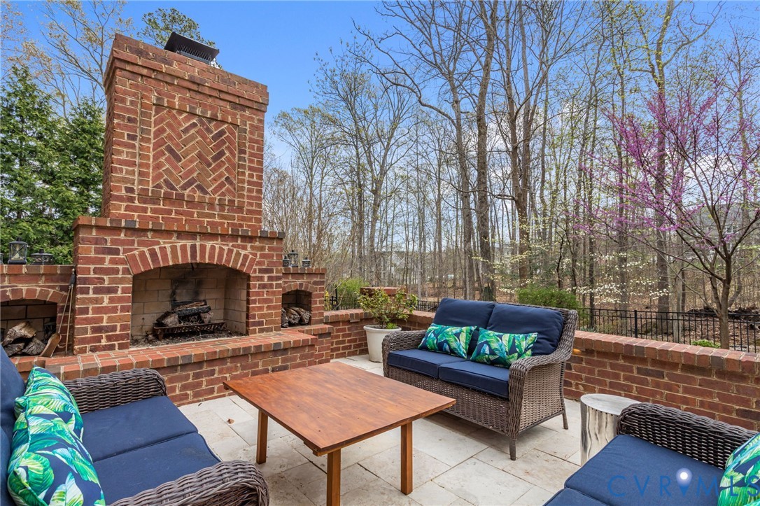 3100 Sodbury Court Midlothian, VA 23113 - Photo 75 of 94 a outdoor space with patio fireplace and a couch