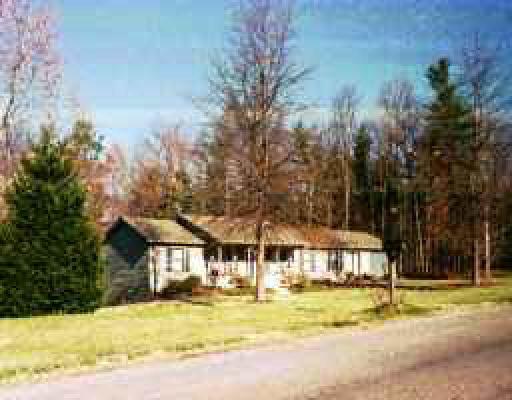 1061 Farmington Road Hardy, VA 24101 - Photo 1 of 1 a view of a house with pool and sitting area