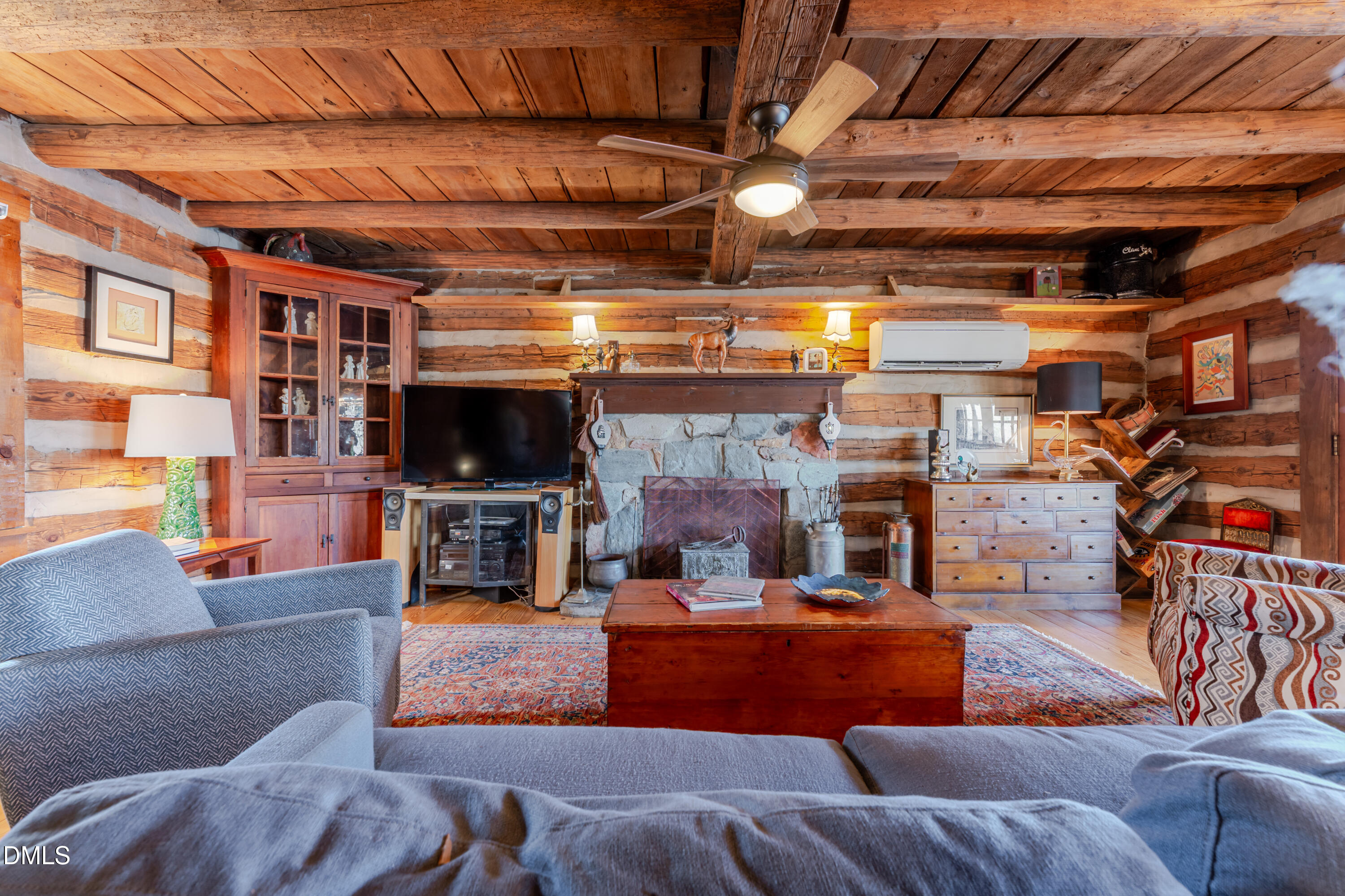 954 Huff Garrett Road Roxboro, NC 27574 - Photo 17 of 98 a living room with furniture and a flat screen tv