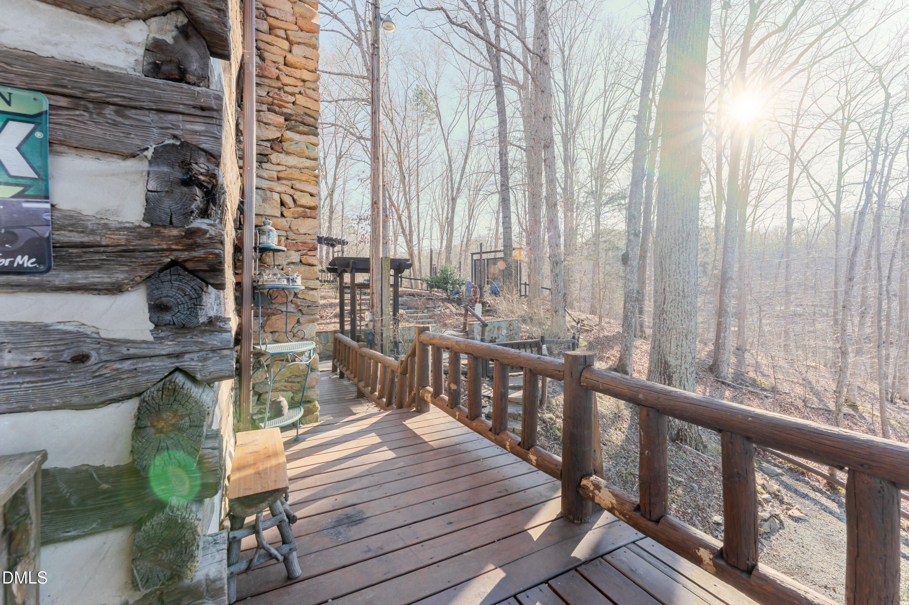 954 Huff Garrett Road Roxboro, NC 27574 - Photo 22 of 98 a view of a balcony with wooden floor