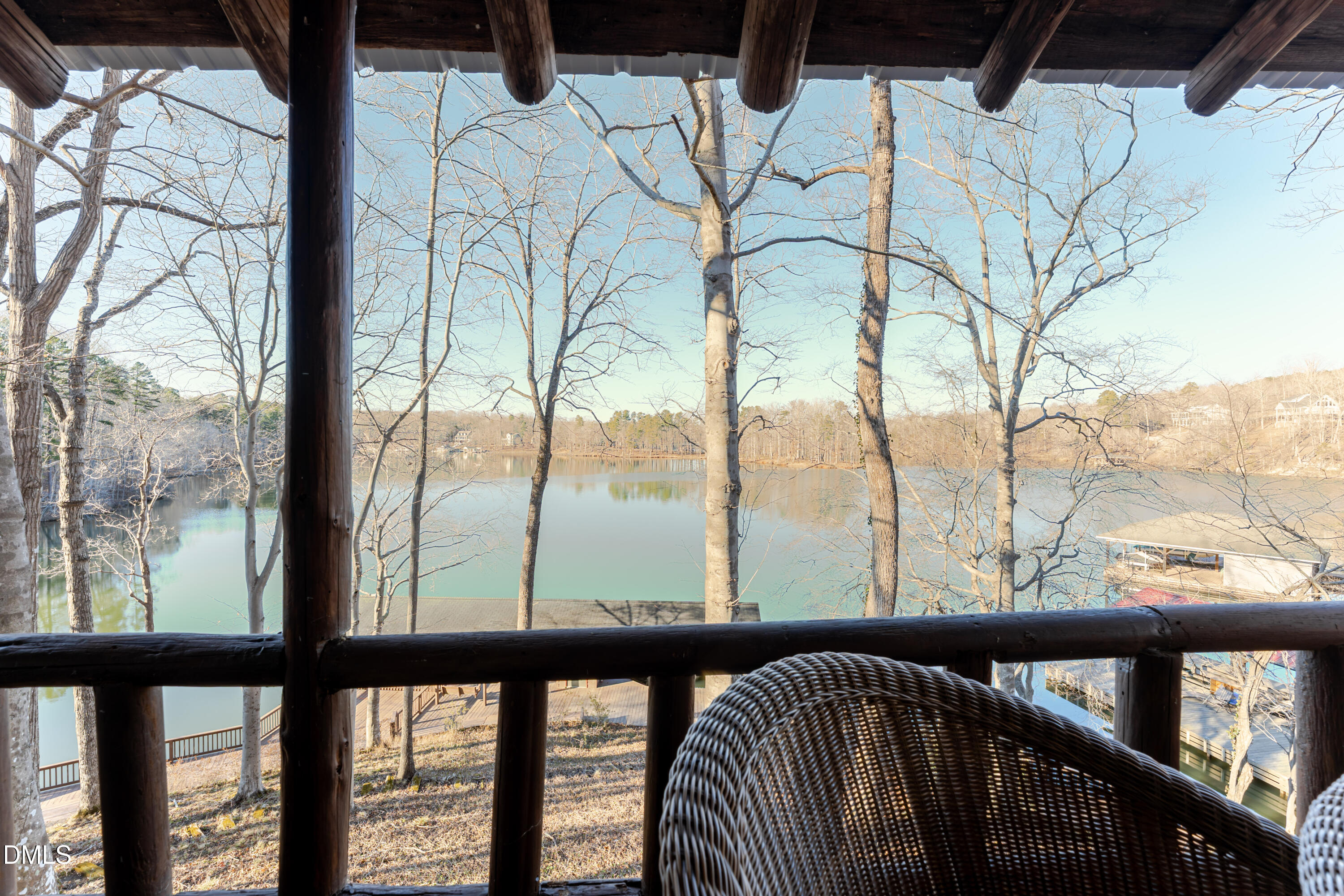 954 Huff Garrett Road Roxboro, NC 27574 - Photo 24 of 98 a view of a balcony with wooden floor and fence