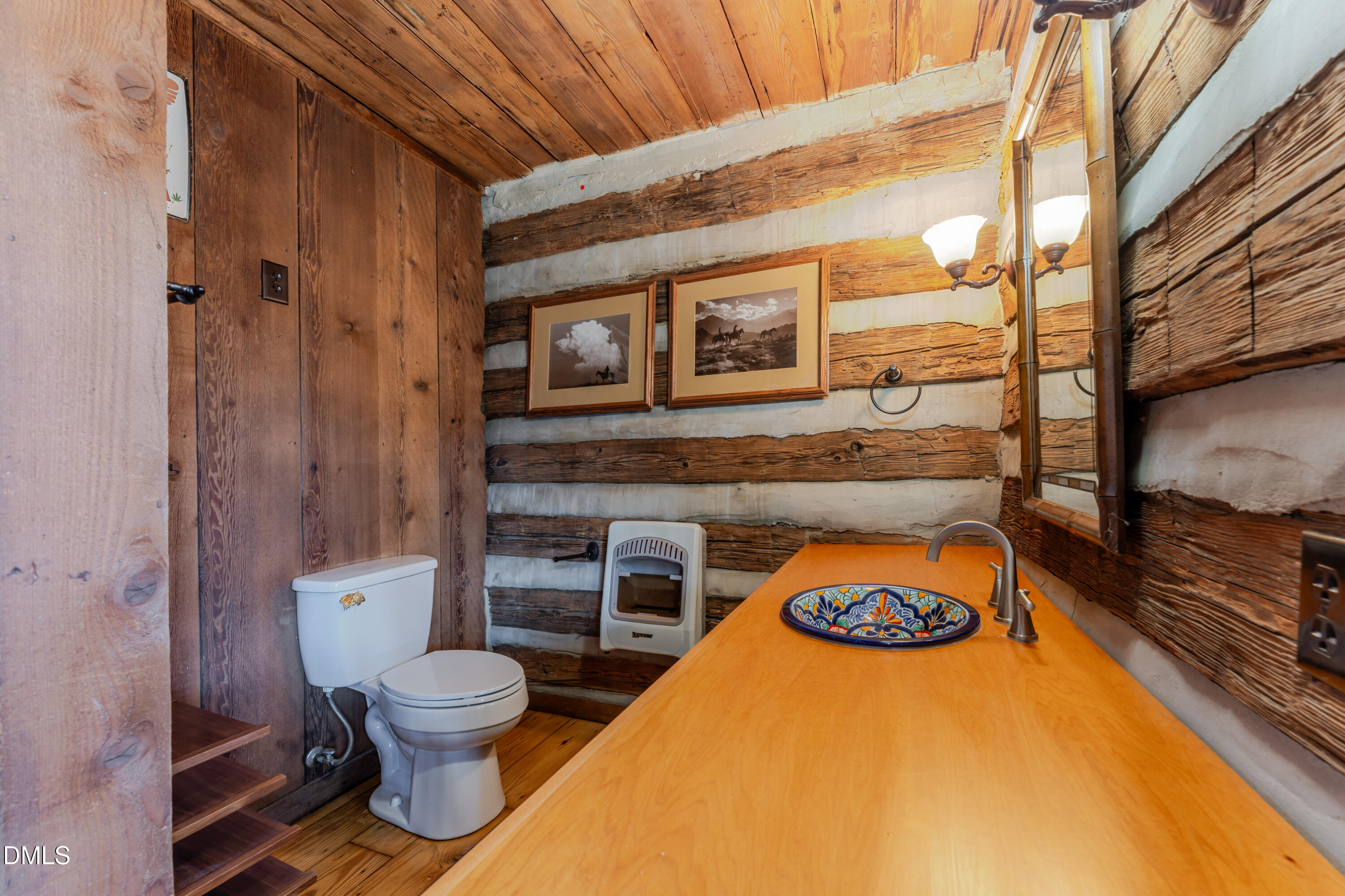954 Huff Garrett Road Roxboro, NC 27574 - Photo 27 of 98 a bathroom with a toilet and a sink