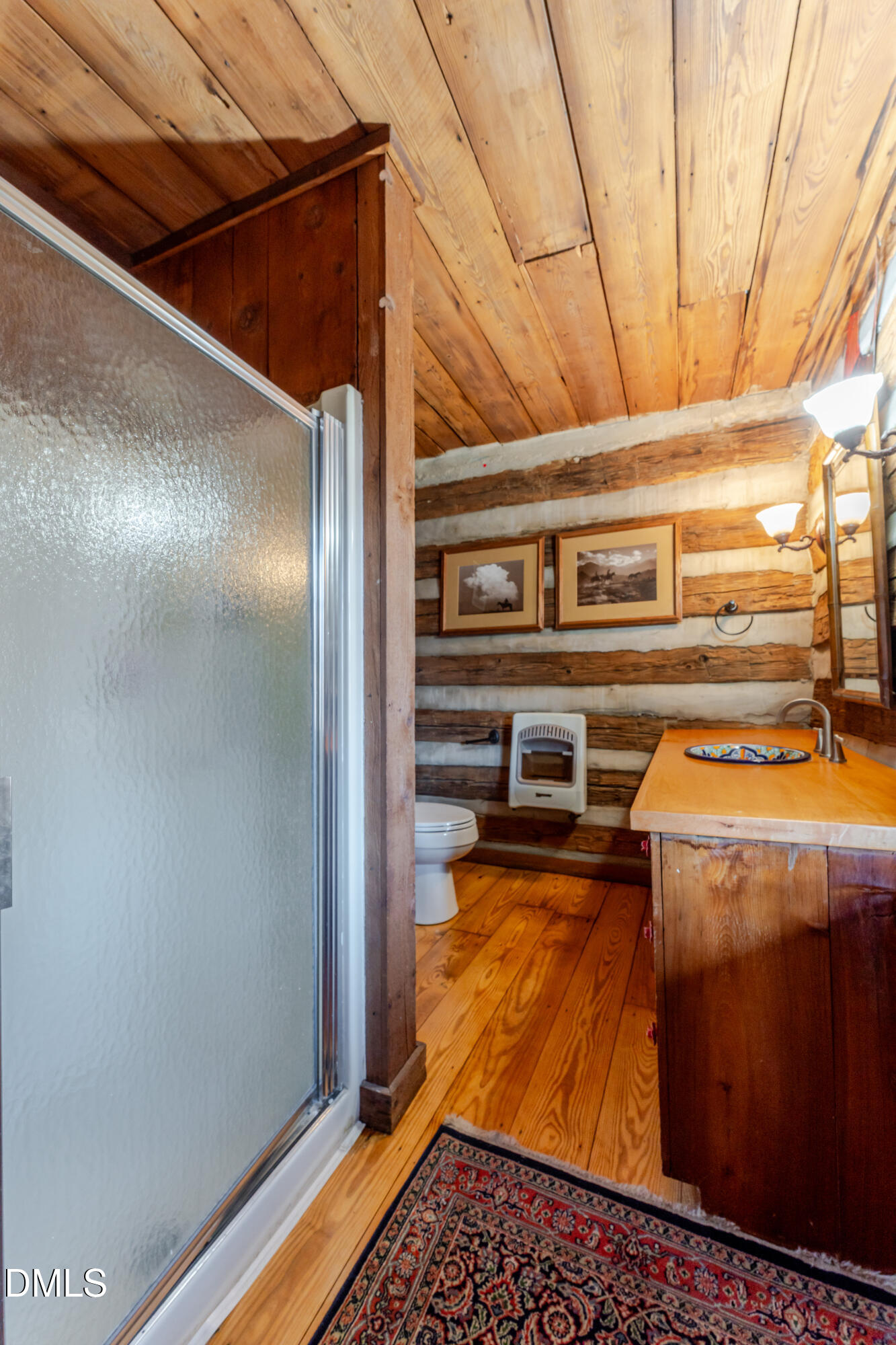 954 Huff Garrett Road Roxboro, NC 27574 - Photo 29 of 98 a view of a refrigerator in an empty room