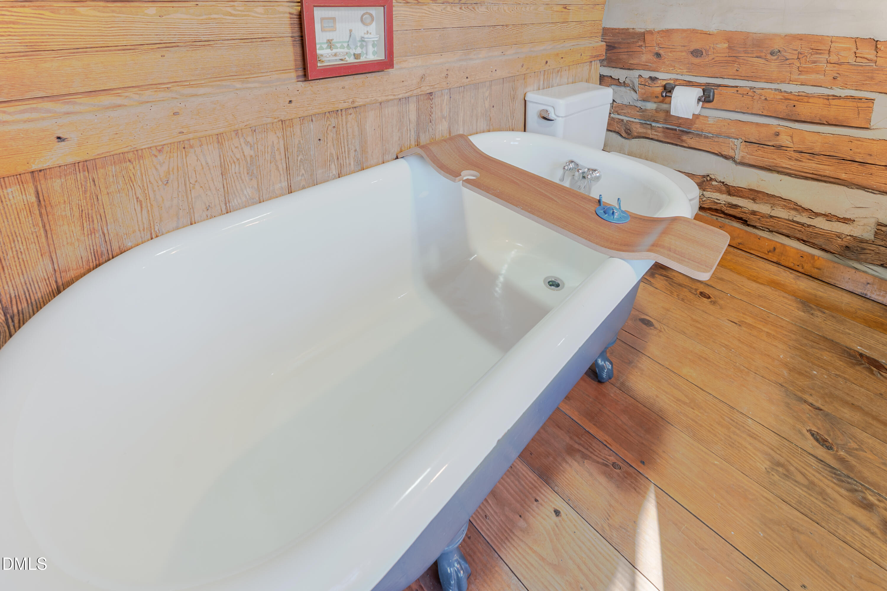 954 Huff Garrett Road Roxboro, NC 27574 - Photo 49 of 98 a bathroom with a sink and a mirror