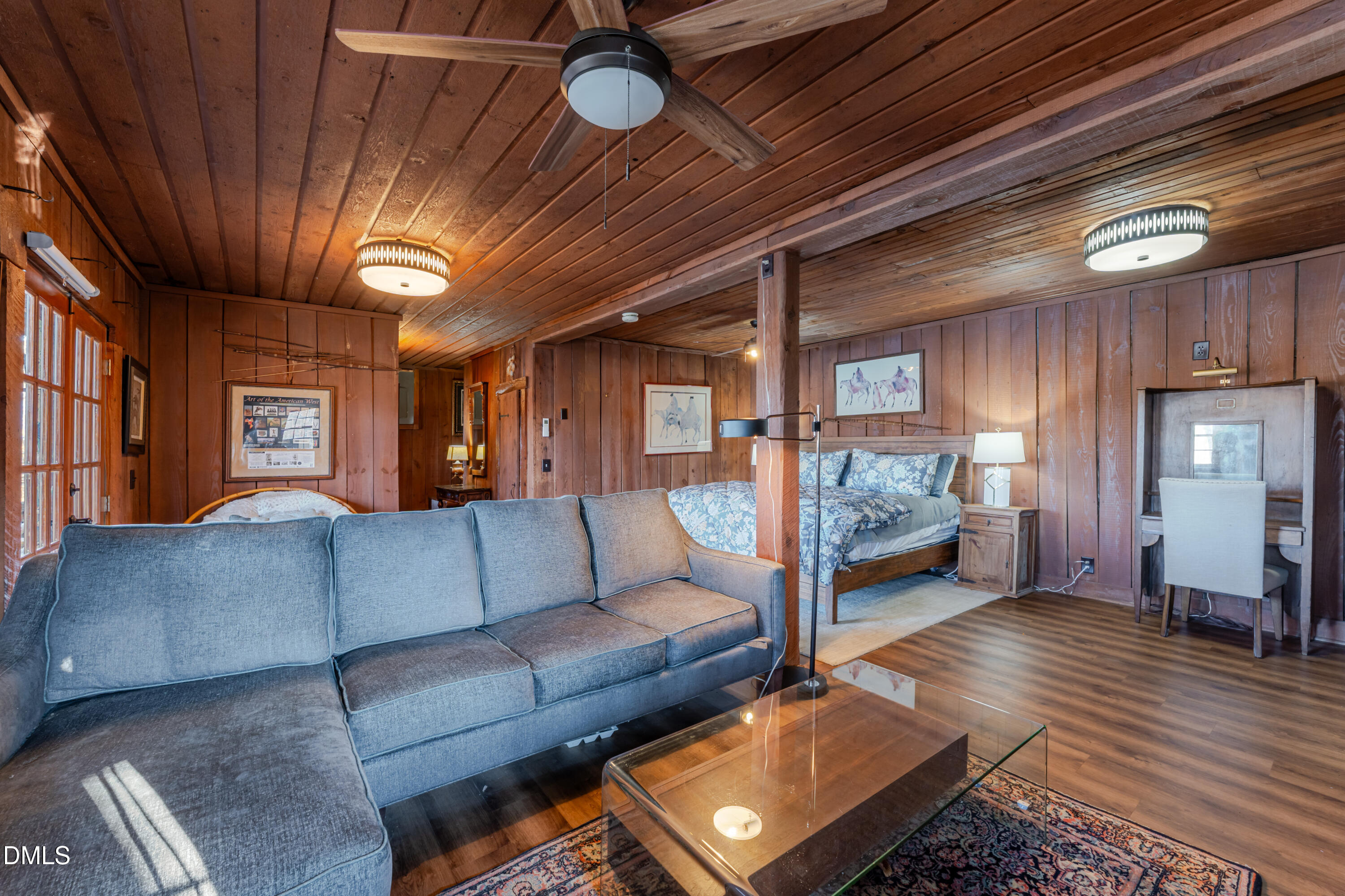954 Huff Garrett Road Roxboro, NC 27574 - Photo 62 of 98 a living room with furniture and a wooden floor