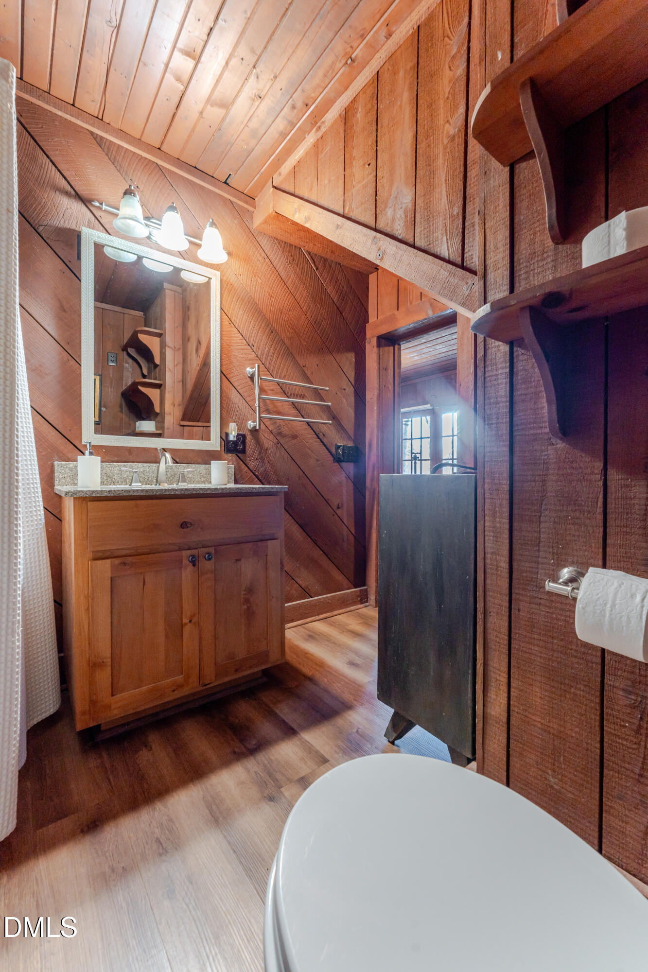 954 Huff Garrett Road Roxboro, NC 27574 - Photo 71 of 98 a view of a hallway with a washer and dryer