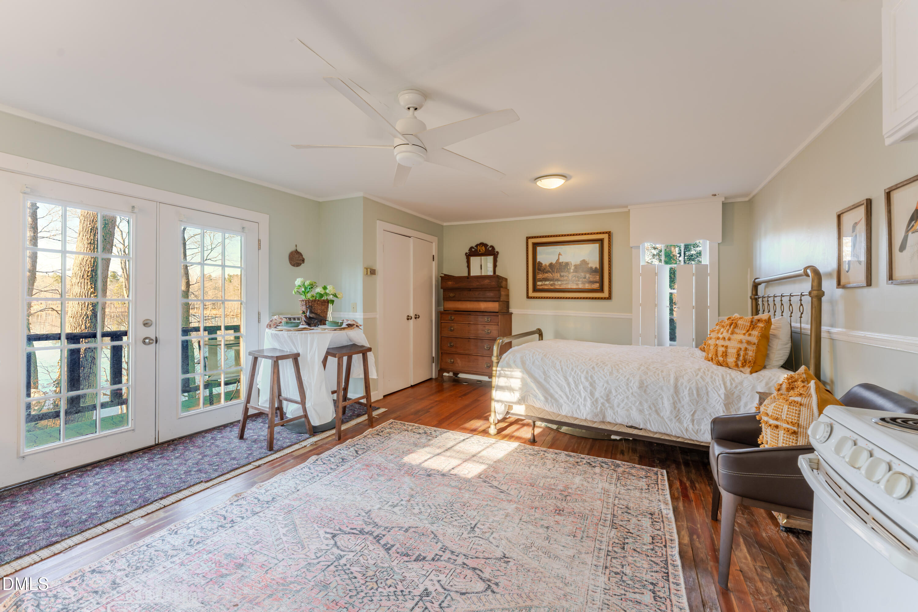 954 Huff Garrett Road Roxboro, NC 27574 - Photo 81 of 98 a bedroom with furniture and a window