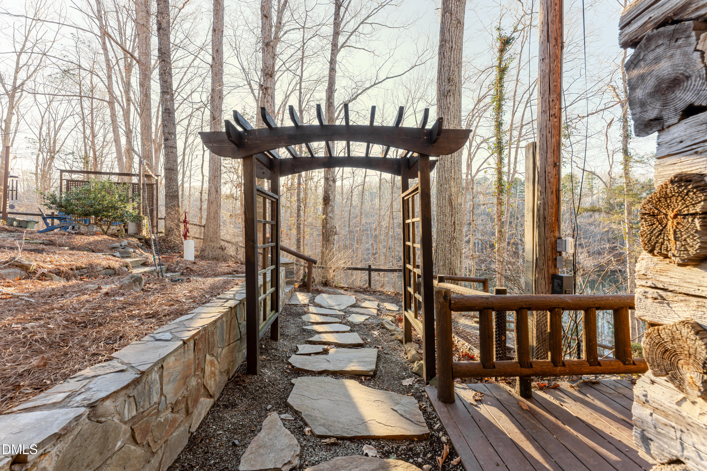 954 Huff Garrett Road Roxboro, NC 27574 - Photo 89 of 98 a view of a chairs and table on the deck