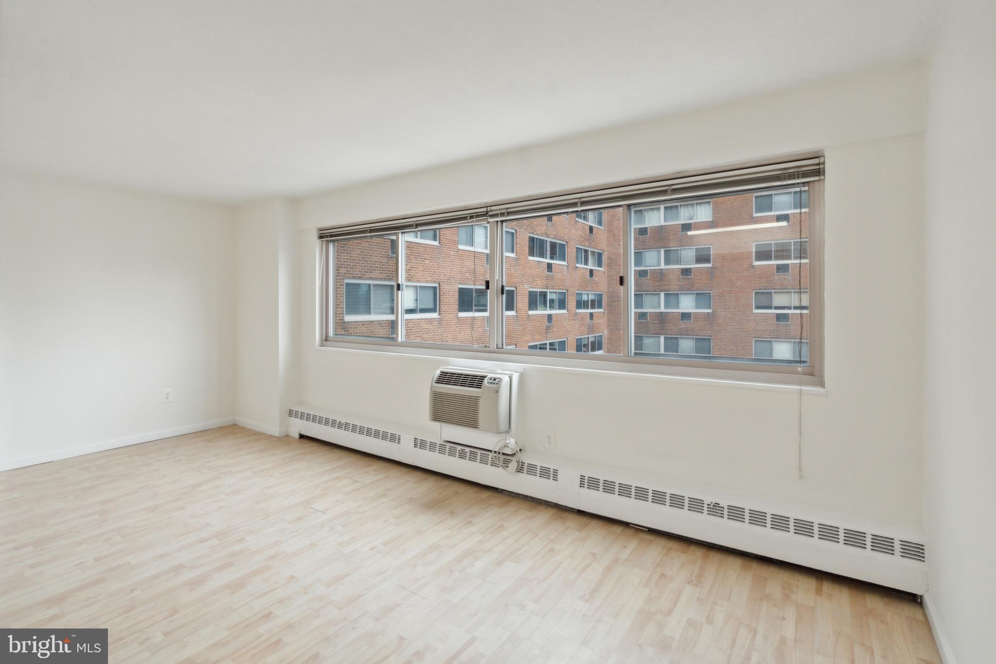 2101 Chestnut Street, Unit 1102 Philadelphia, PA 19103 - Photo 1 of 17 a view of an empty room with a window