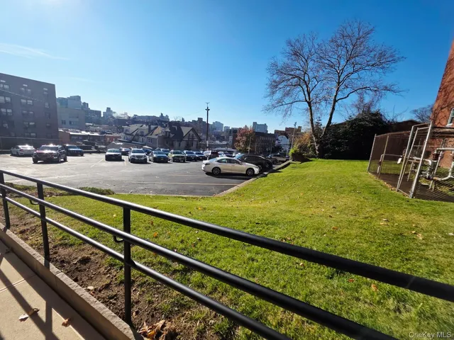 a view of swimming pool from a balcony