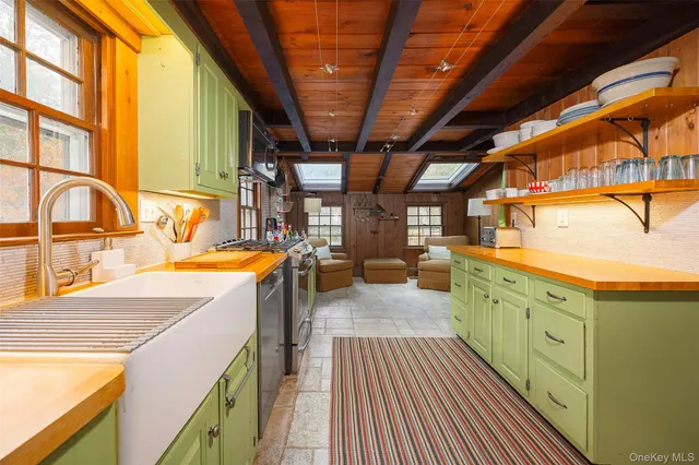 a view of a bathroom with a sink and a dishwasher