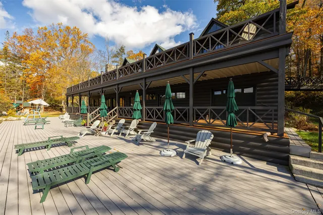 a view of a chairs and table in a patio