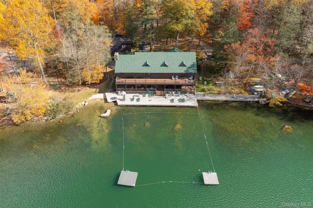 a view of a lake with a building in the background