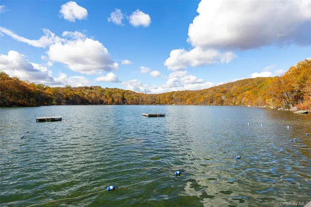 a view of a chairs and table in the patio
