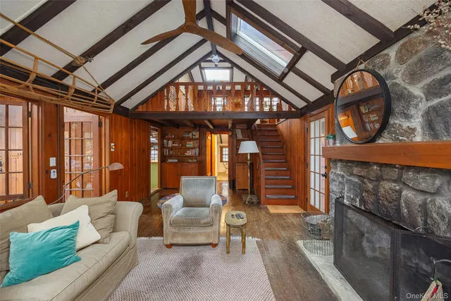 a outdoor living space with furniture and a fireplace