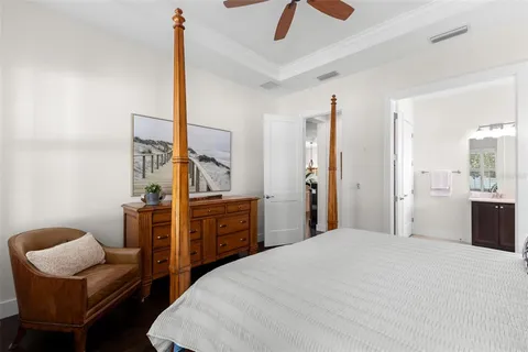 a bedroom with a bed and furniture