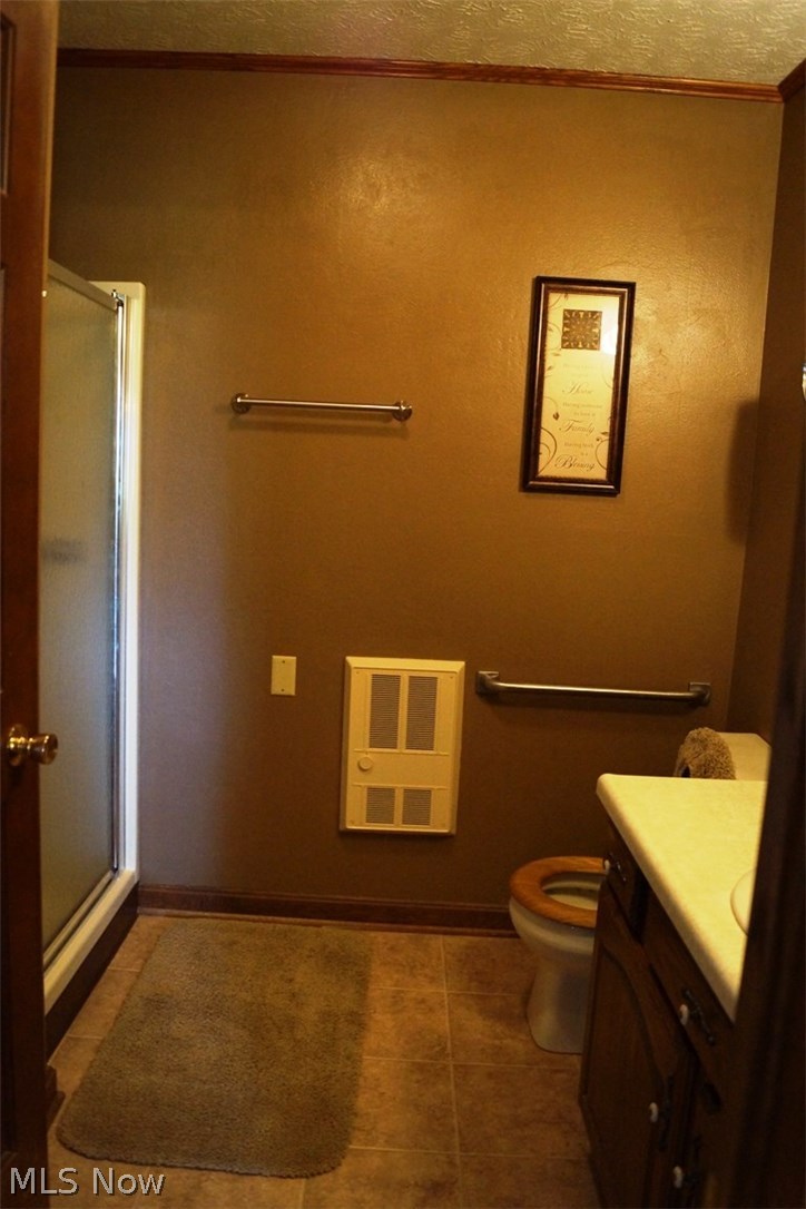 8472 Lowmiller Road Minerva, OH 44657 - Photo 24 of 35 FULL BATH WITH WALK-IN SHOWER IN THE IN-LAW SUITE.