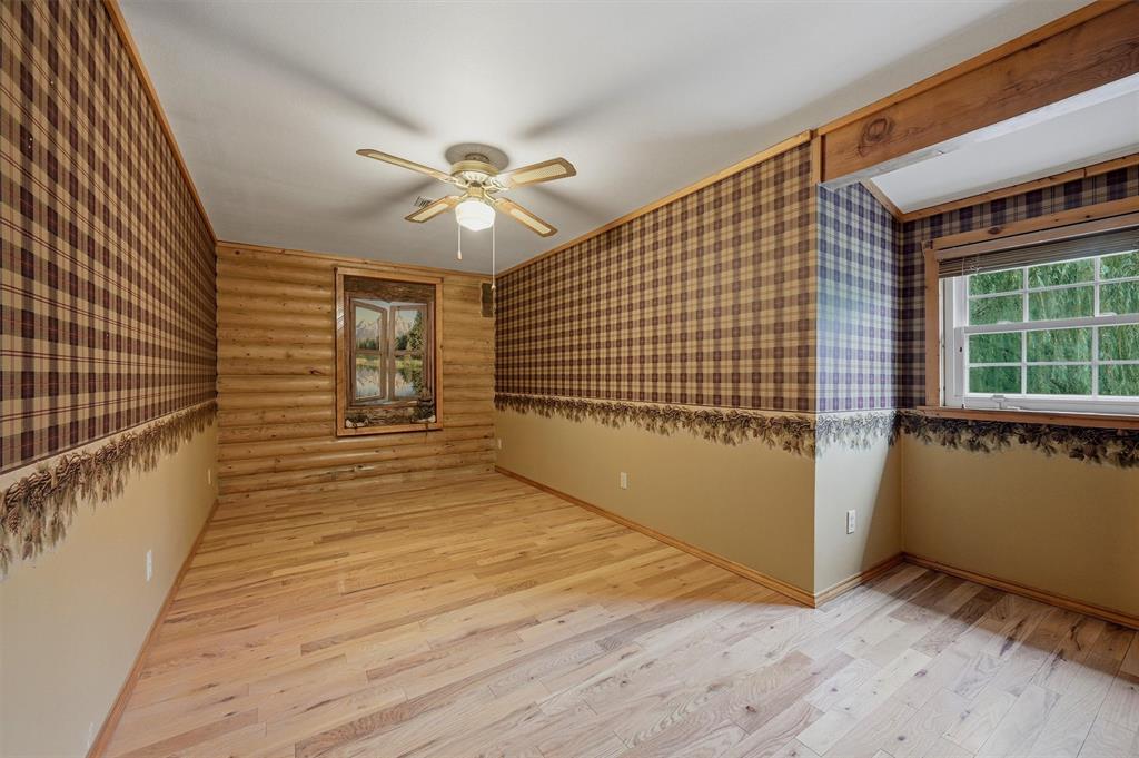 570 Ayres Road Bells, TX 75414 - Photo 28 of 40 a view of empty room with wooden floor and fan