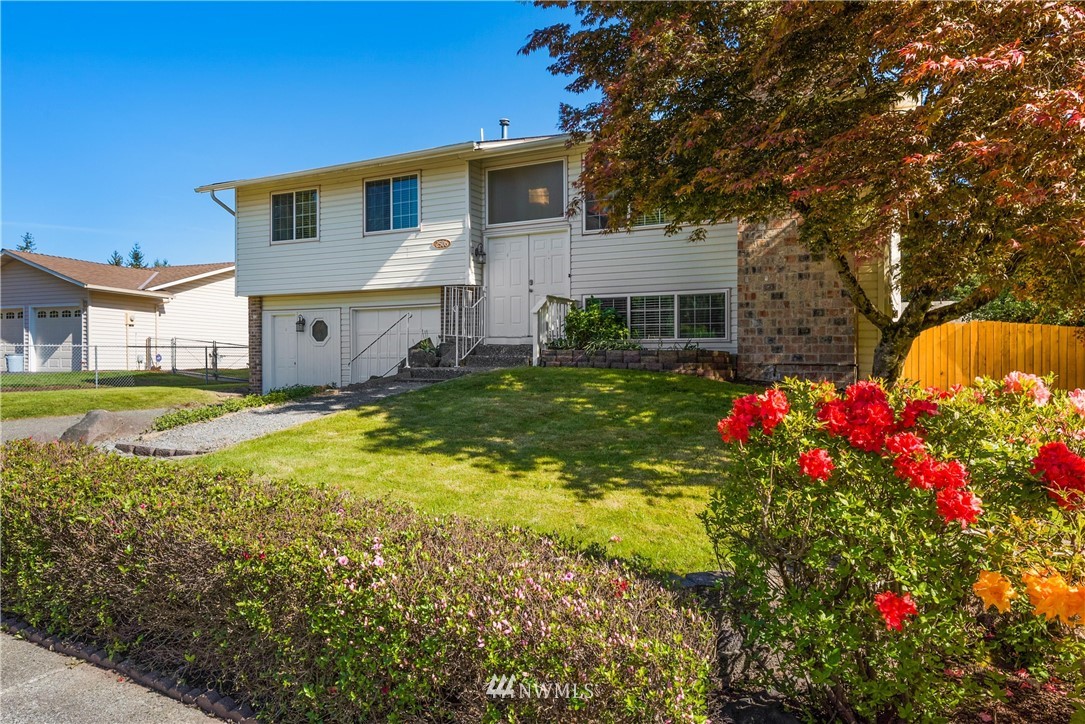 2506 170th Street Southeast Bothell, WA 98012 - Photo 2 of 27 a front view of house with yard and green space