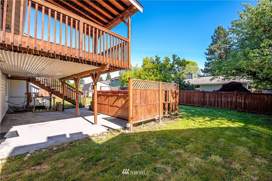 2506 170th Street Southeast Bothell, WA 98012 - Photo 25 of 27 a view of backyard with deck and trees