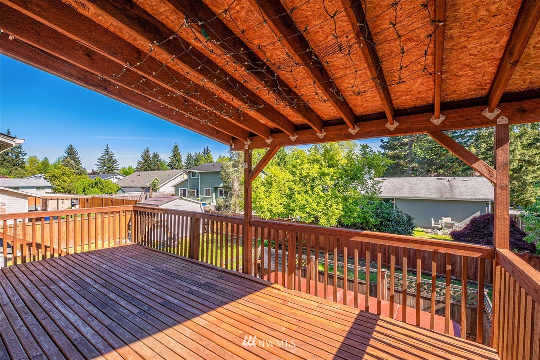 2506 170th Street Southeast Bothell, WA 98012 - Photo 27 of 27 a view of a wooden deck with a yard