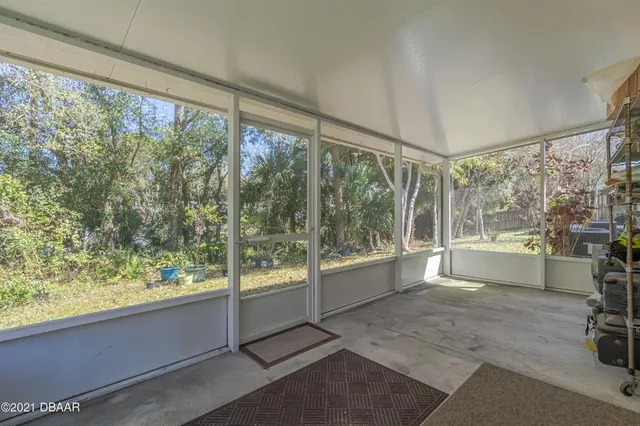 a large white room with a large window