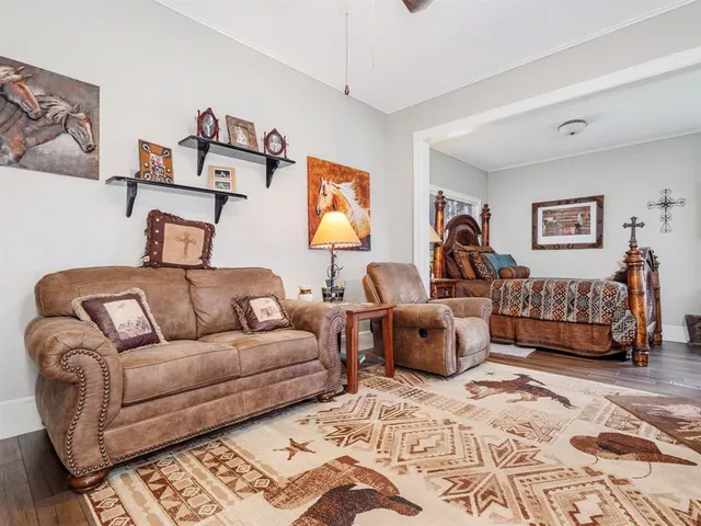 a living room with furniture and a couch