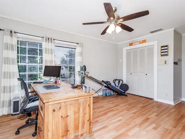 a workspace with furniture and a window