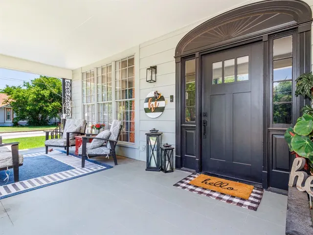 a backyard of a house with seating space