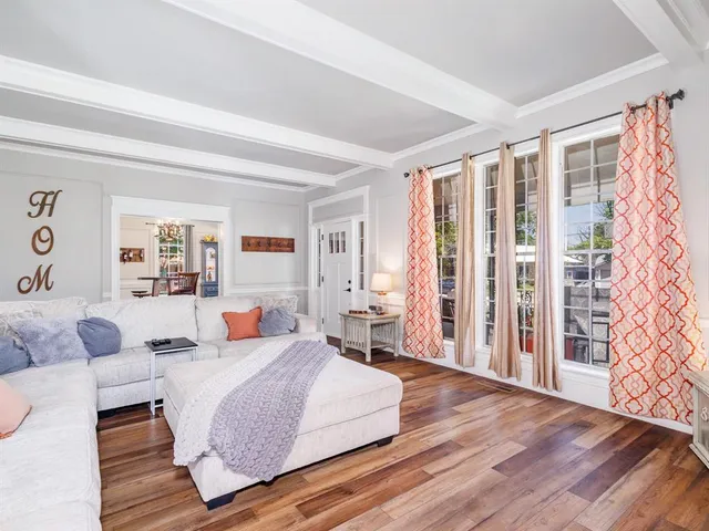 a bedroom with a large bed and a couch