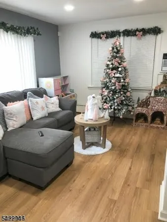 a living room with furniture and a window