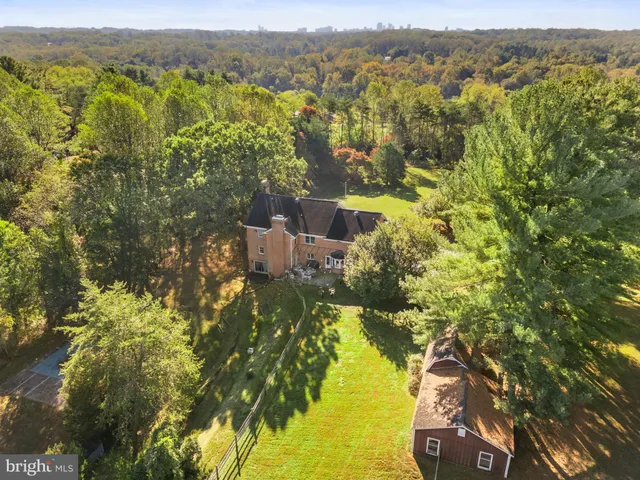 a view of a swimming pool with a lake view