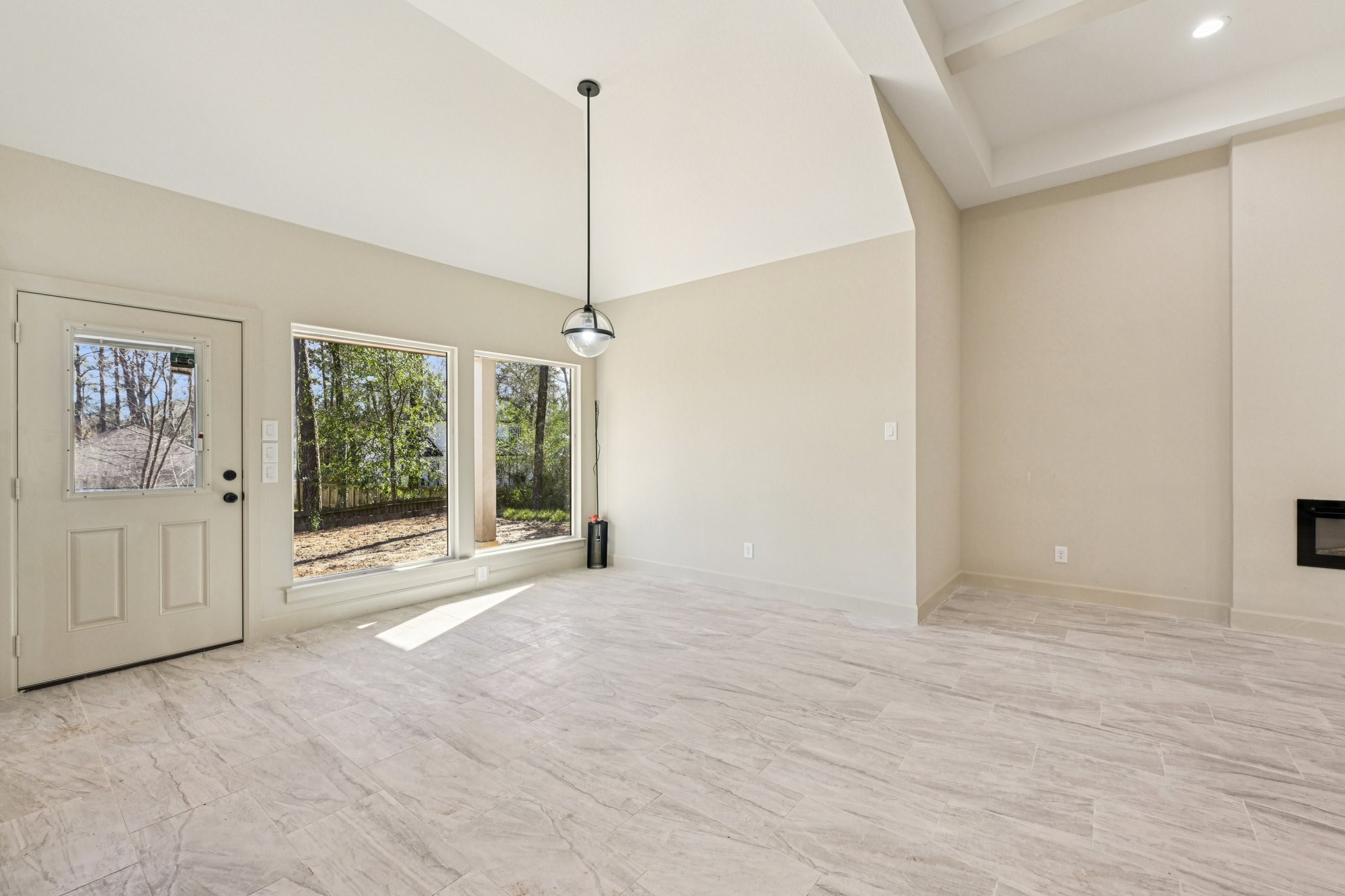 15132 Coaltown Road Willis, TX 77378 - Photo 4 of 29 Bright and spacious Dining area with large windows offering plenty of natural light and views of the outdoors.