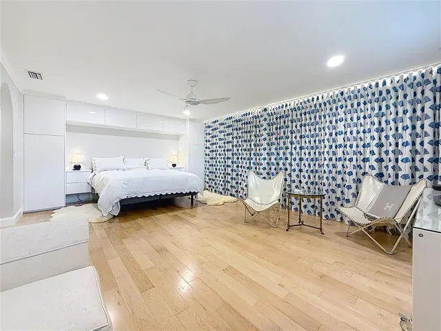 a bathroom with a double vanity sink mirror and