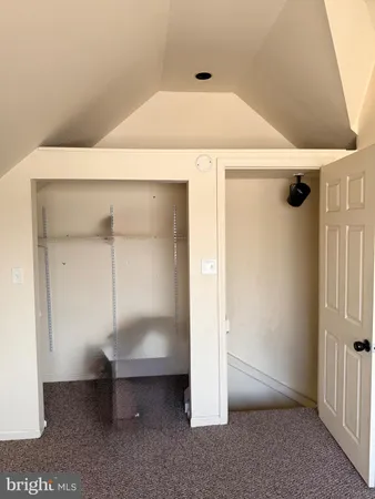 a view of empty room with windows