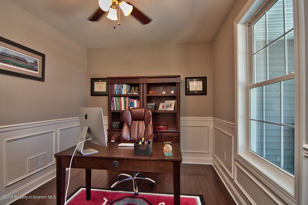 126 Highland Road Moscow, PA 18444 - Photo 21 of 77 a view of a workspace with furniture and a window
