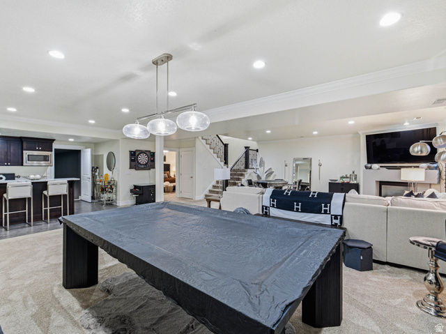 1154 Sunset Dunes Way Draper, UT 84020 - Photo 40 of 50 Playroom with billiards, light carpet, wet bar, recessed lighting, and a fireplace