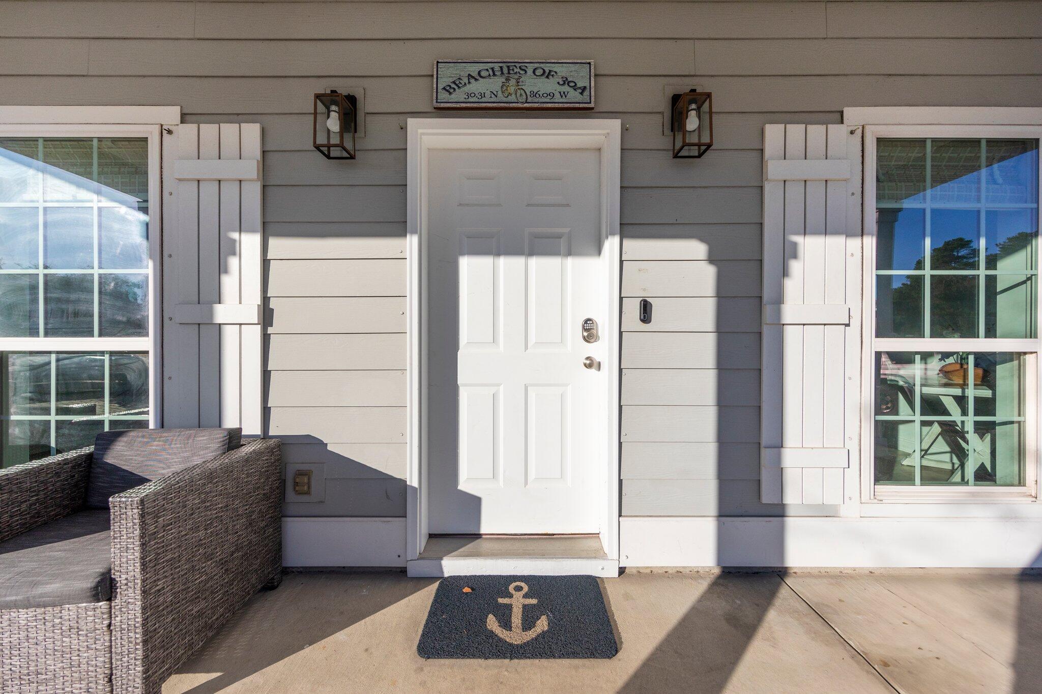 91 Grayling Way Inlet Beach, FL 32461 - Photo 3 of 43 a view of a entryway door of the house