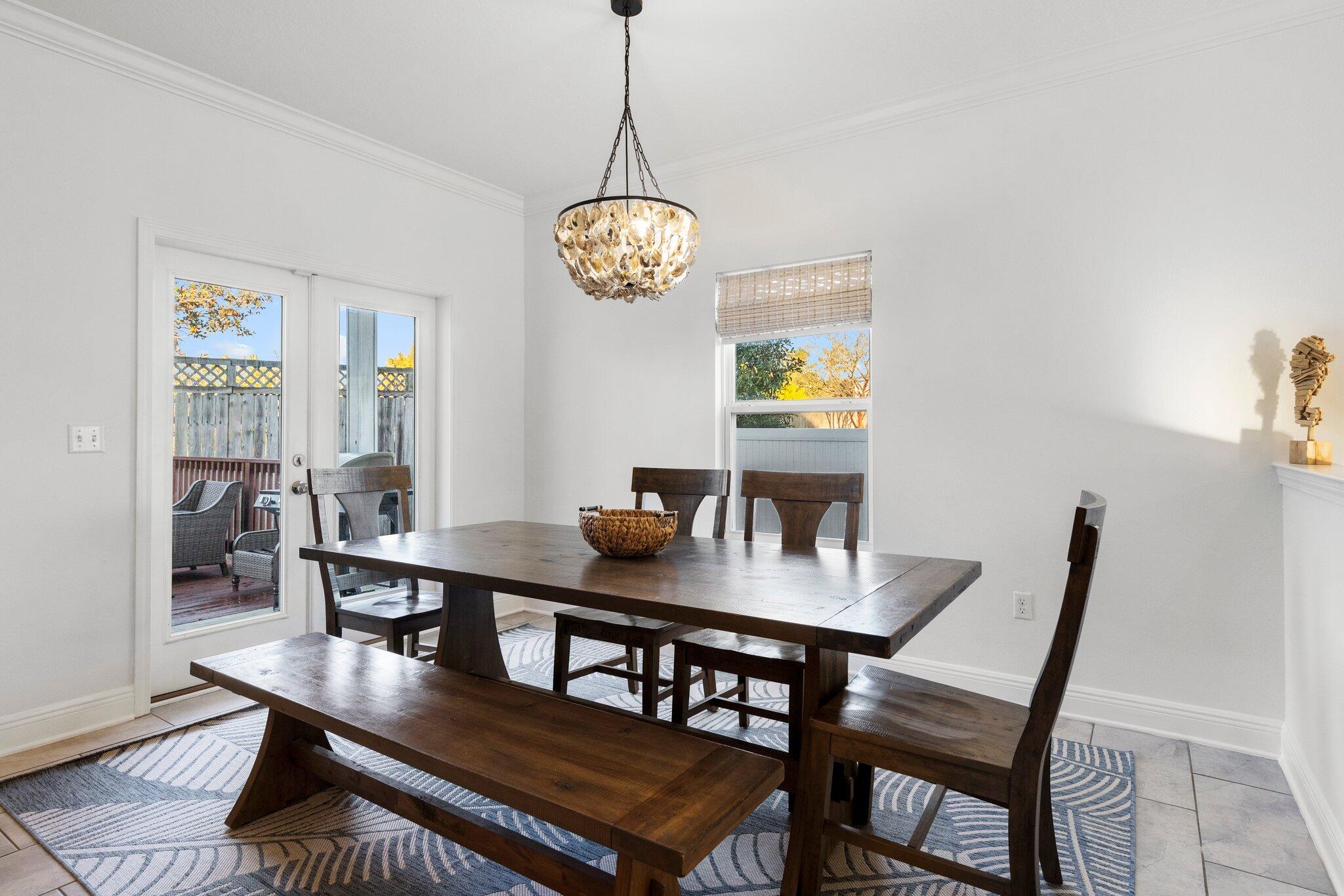91 Grayling Way Inlet Beach, FL 32461 - Photo 7 of 43 a view of a dining room with a table and chairs