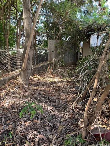 a backyard of a house with lots of green space
