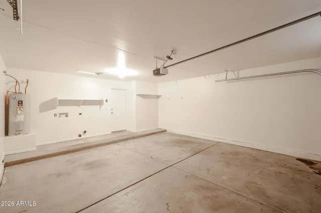 a view of a utility room with closet